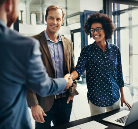 Associates shaking hands